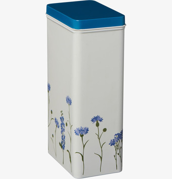 Bild av fyrkantig plåtburk med blåklint och blommotiv