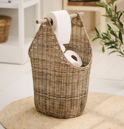 Bild av stilren rottingkorg för toalettpappersförvaring