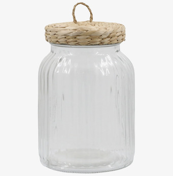 Bild av elegant glasburk med flätat lock och räfflor