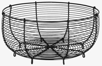 Bild av rund svart trådkorg med stilren och luftig design