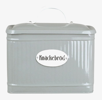 Bild av elegant grön plåtburk för knäckebröd i köket