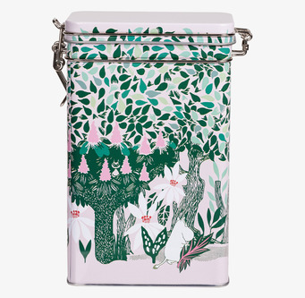 Bild på rektangulär plåtburk med naturmotiv och vårkänsla