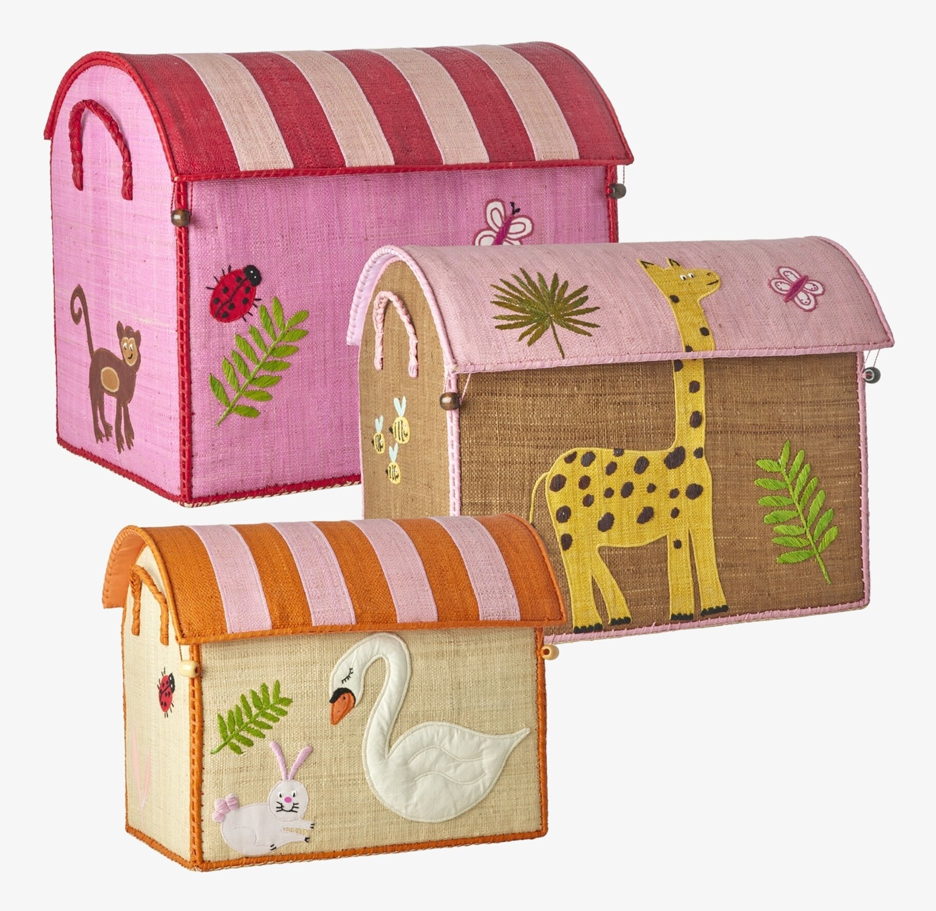 Bild: Tre djurmotiv i rosa och naturfärgade förvaringshus