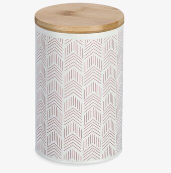 Bild på exklusiv rund plåtburk med trälock och rosa mönster