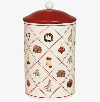 Bild av liten julig plåtburk med rutmönster och vintermotiv