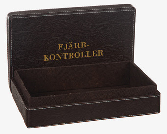 Bild: Elegant konstläderlåda för fjärrkontroller och småprylar