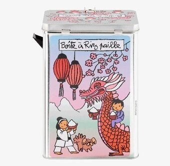 Bild av färgglad plåtburk med asiatisk drake och rislyktor