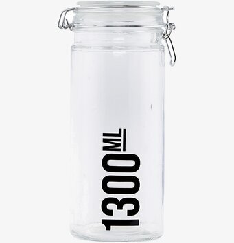 Foto av stilren glasburk med lock och metallspänne