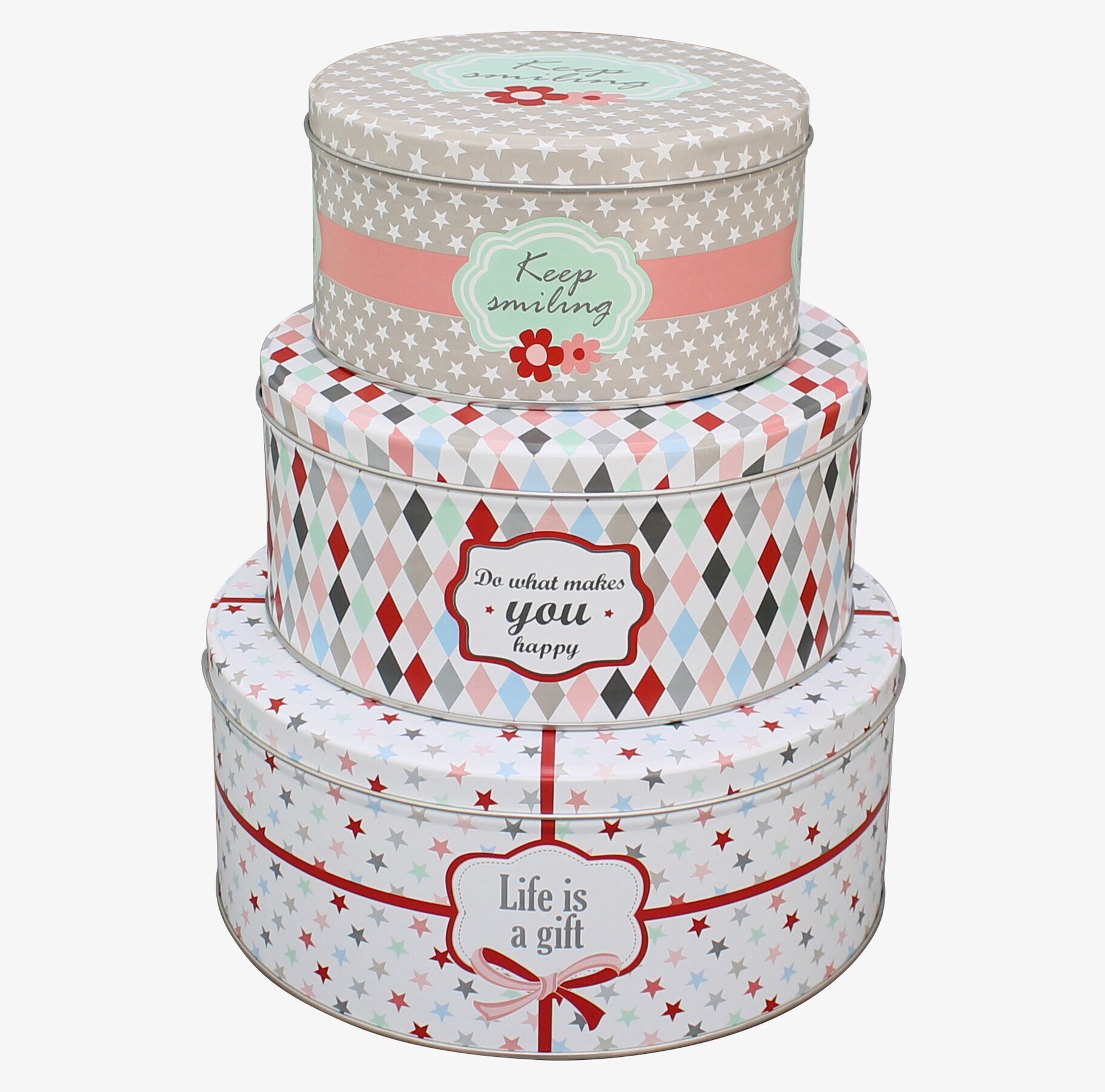 Bild av tre staplade plåtburkar med livfull design