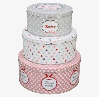 Foto av stilfulla och färgglada plåtburkar för hemmet