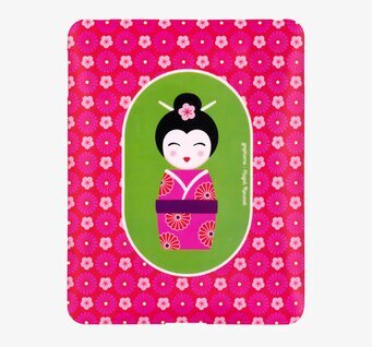 Bild av unik plåtburk med japansk dockdesign