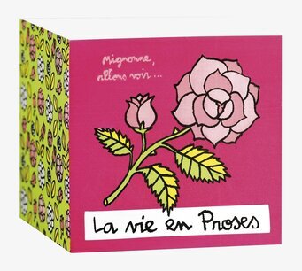 Bild av färgstark plåtburk med rosdesign och fransk text