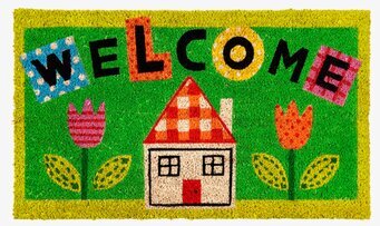 Bild av färgglad dörrmatta med välkomnande design