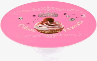 Bild av rosa tårtfat med cupcake och dekorativa inslag