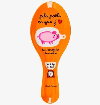 Bild av färgglad skedhållare med humoristisk design