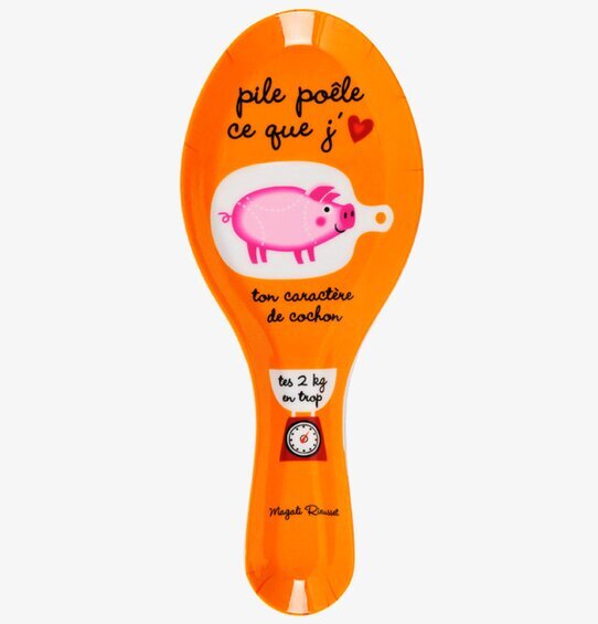 Bild av färgglad skedhållare med humoristisk design