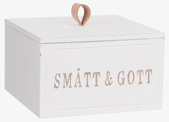 Bild av stilren och funktionell trälåda med läderhandtag