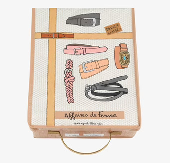 Bild av stilfull förvaringsbox med bältesillustrationer