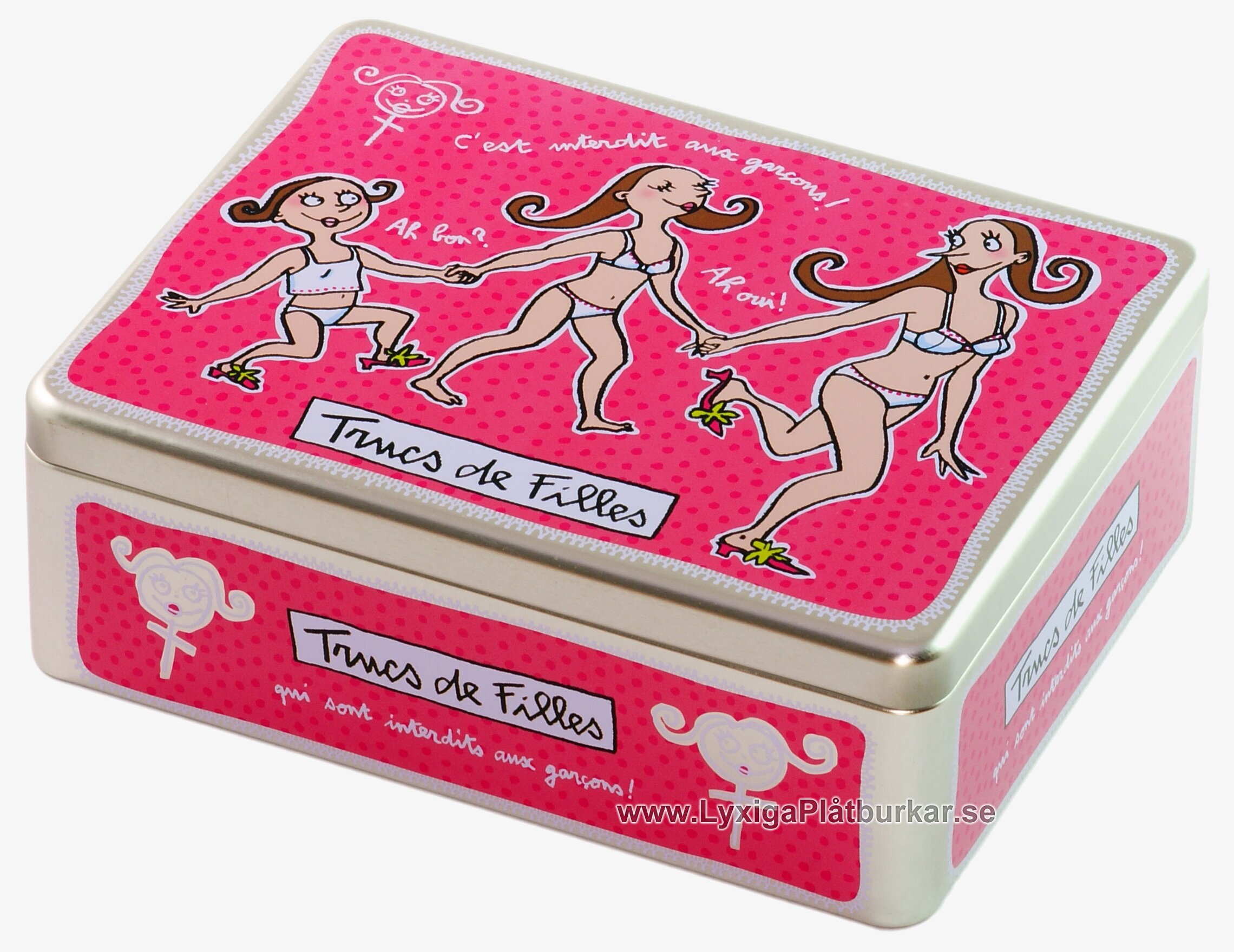 Bild av cerise plåtburk med lekfullt prickmönster