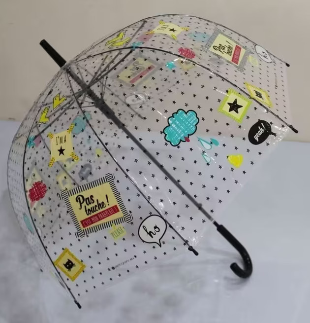 Bild av unikt paraply med stjärnor och färgglada motiv